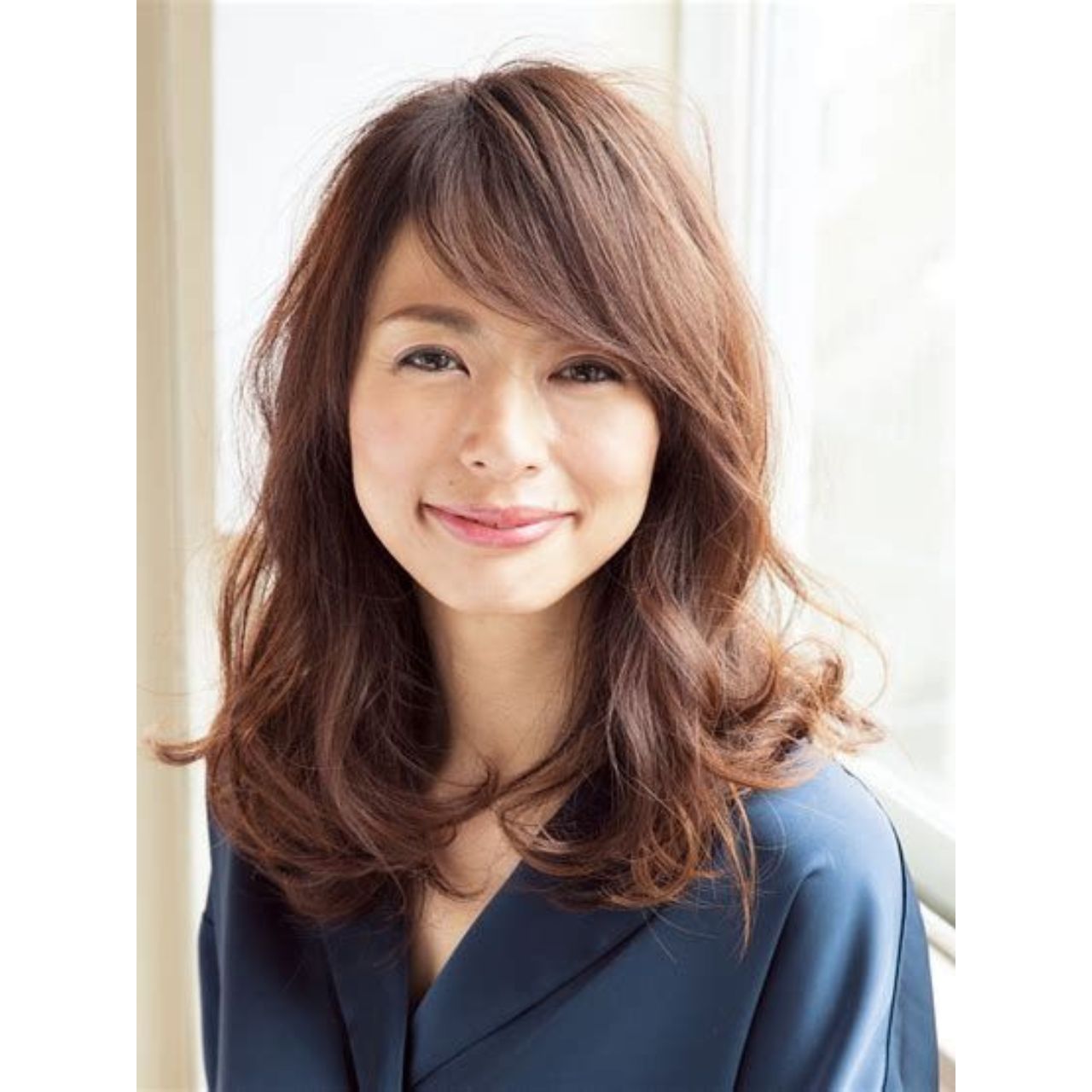 50代女性の痛くないロングヘアのコーディネート例